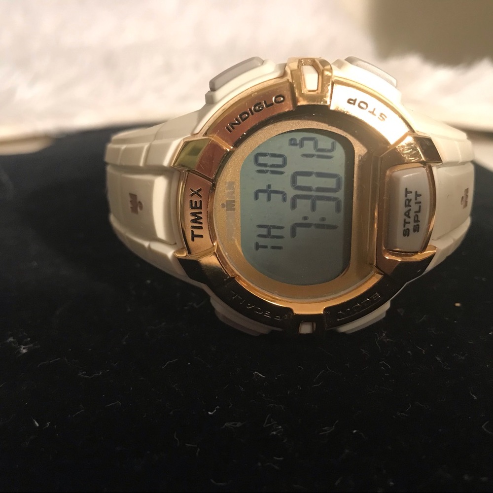 Timex Ironman cream color with gold hardware.